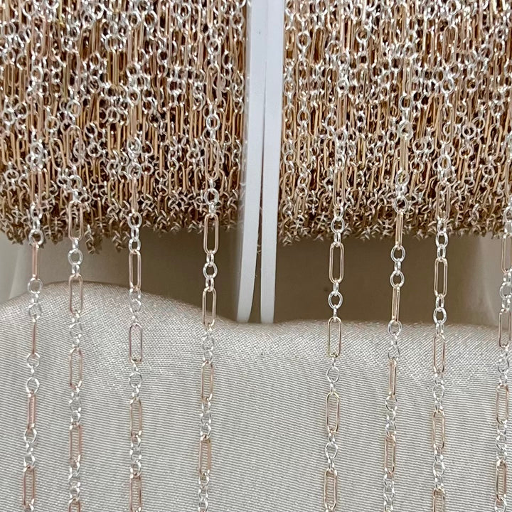 CX129: Mixed Metal 2 Tone Long and Short Paperclip Chain by the foot
