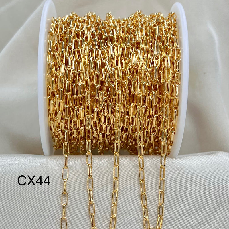 Gold chain on a spool with &