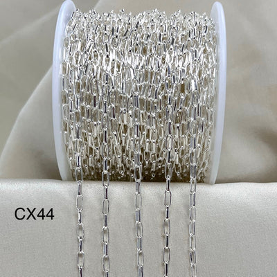 Spool of silver chain with 'CX44' label on a light gray background