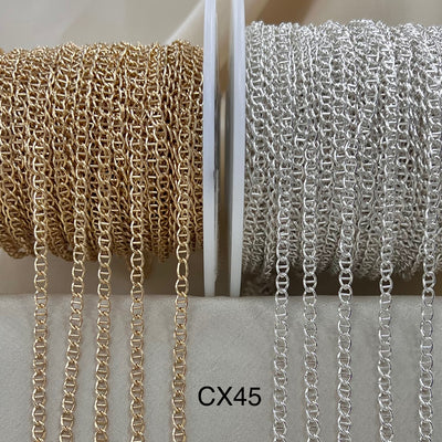 Gold and silver mariner chain spools with 'CX45' label on a neutral background