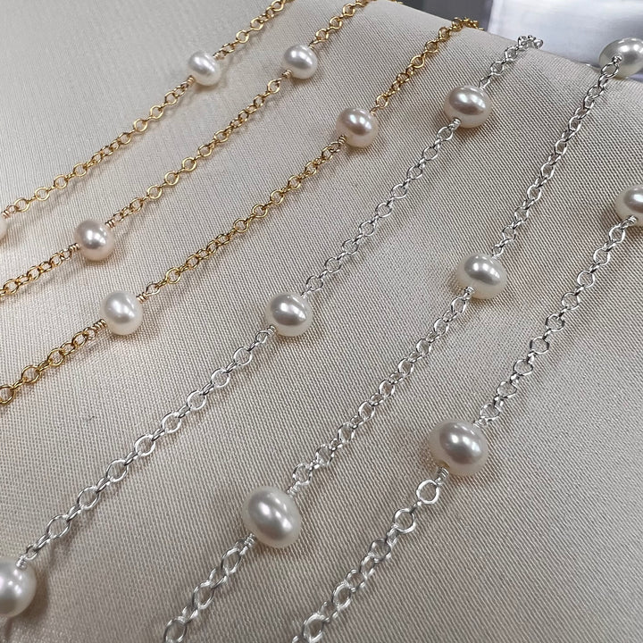CX62A: 1.25” Space Wire Wrapped 4mm Pearl Station Chain By the Foot