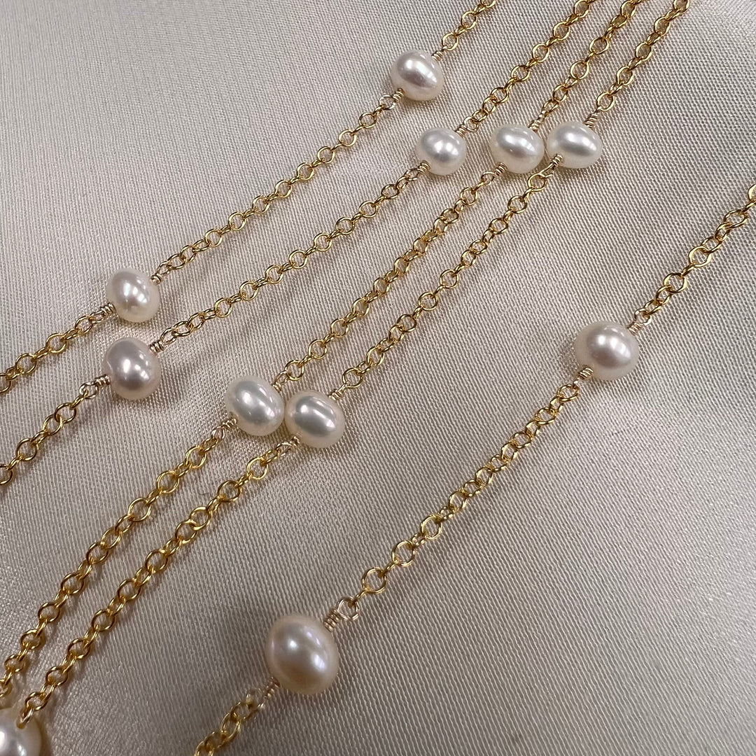 CX62A: 1.25” Space Wire Wrapped 4mm Pearl Station Chain By the Foot