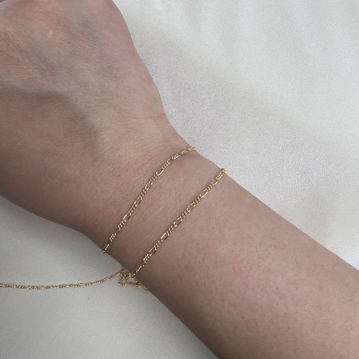CX28: 1.5mm Round Figaro Chain by the foot