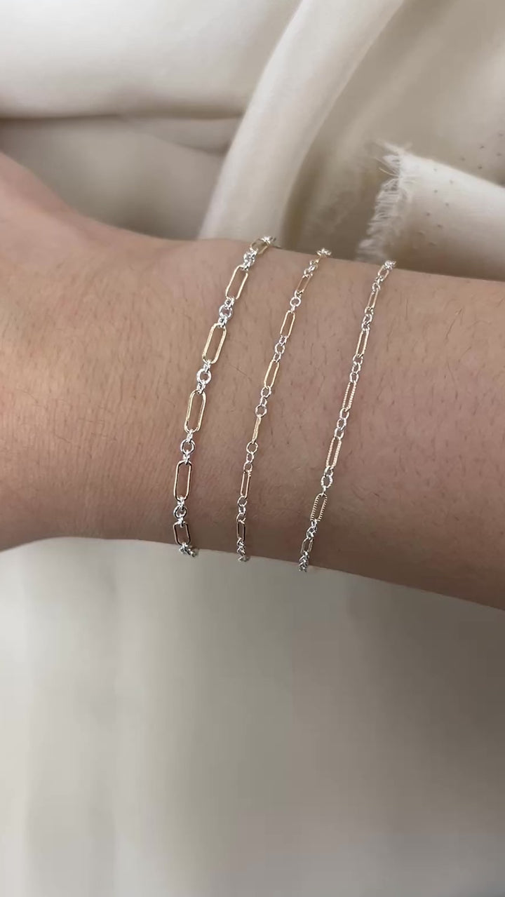 CX129: Mixed Metal 2 Tone Long and Short Paperclip Chain by the foot
