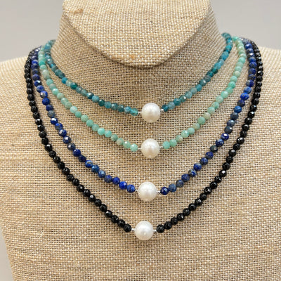 Stone necklace with pearl center